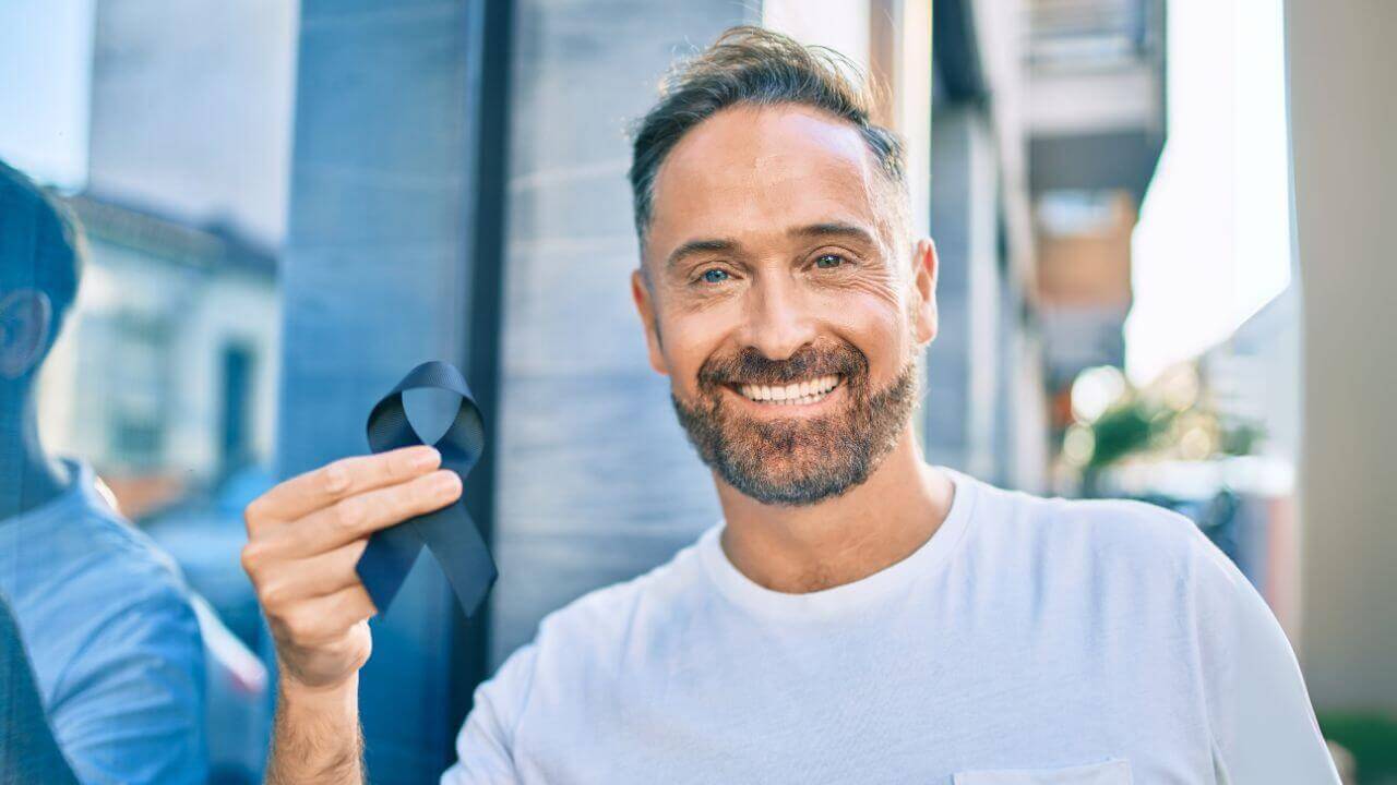 Men’s Health (Part 2) - The male prostate: man with a black ribbon as a sign of commitment to prostate cancer awareness.