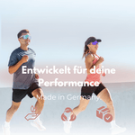 Zwei aktive Menschen joggen, symbolisieren den Magnesium Komplex für verbesserte Performance.