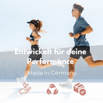 Zwei sportliche Personen laufen zusammen im Freien, optimiert für Leistung, Made in Germany.