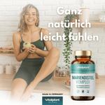 Woman with milk thistle complex capsules, experiencing freshness and natural body cleansing.