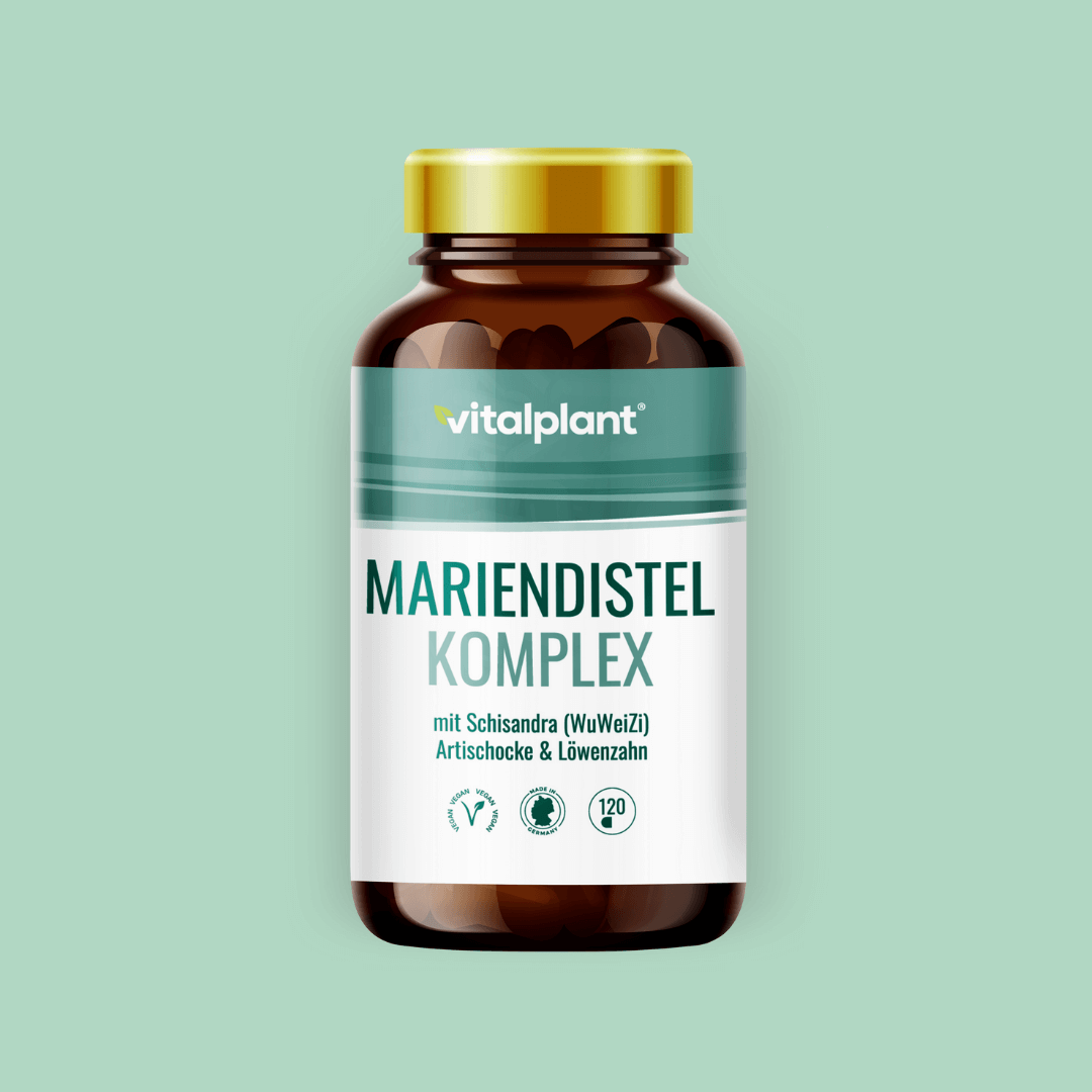 Mariendistel Komplex Kapseln von Vitalplant in einem modernen Fläschchen auf grünem Hintergrund.