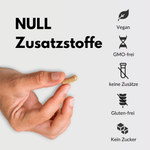 Schwarzes Maca Kapseln in der Hand, NULL Zusatzstoffe, vegan, glutenfrei, keine künstlichen Zusätze.