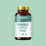 Vitalpilze Komplex Kapseln von Vitalplant in einer braunen Flasche mit goldenen Deckel.