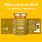 Bio comb honey from Vitalplant in a glass jar with transparent labels on a yellow background.